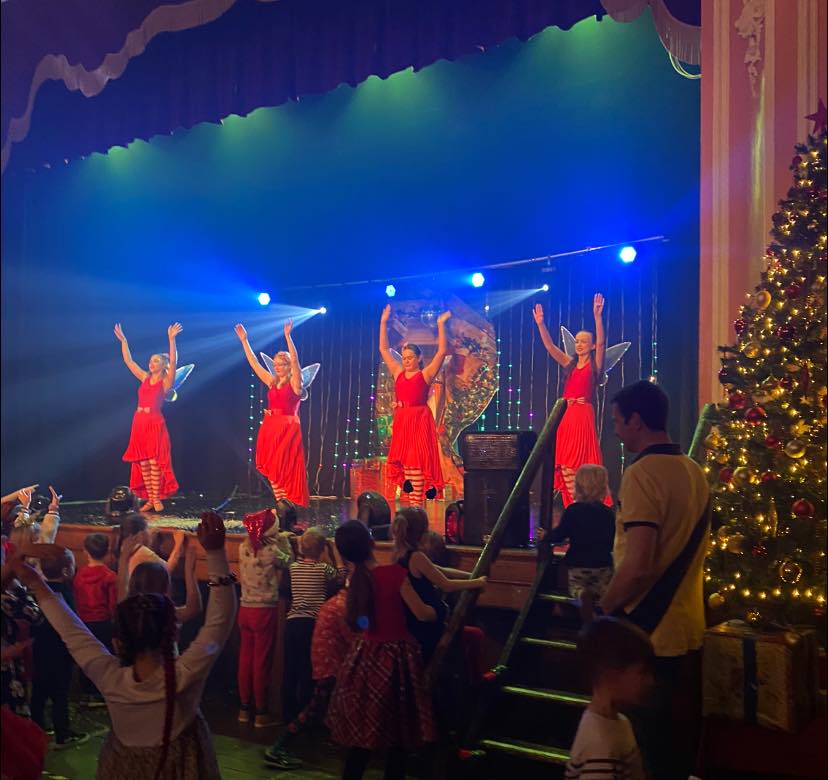Elfie on stage at the Jingle Bell Bop