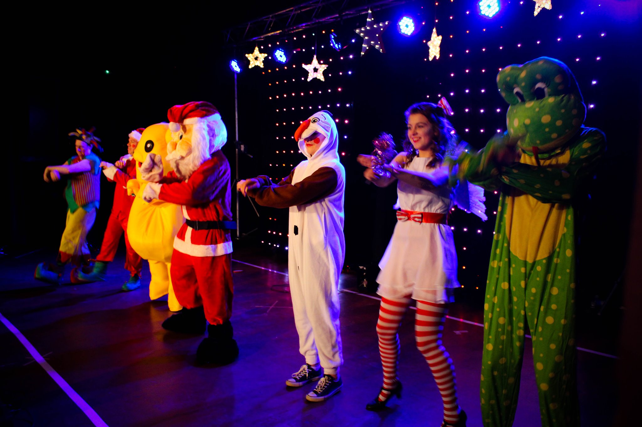 The Jingle Bell Bop cast on stage